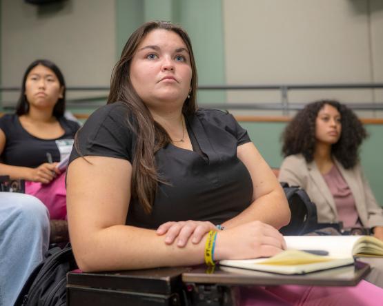 OHIO students listen to a speaker at the Women in Business event