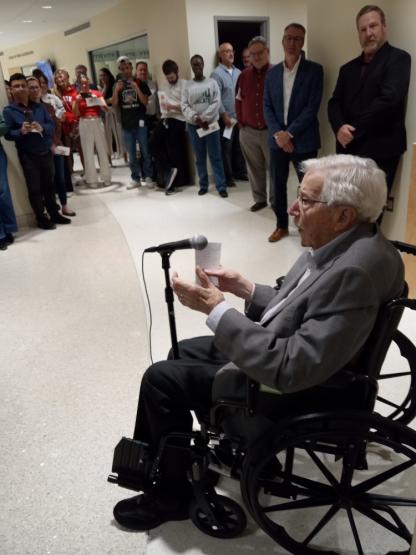 Paul H. Miller speaks during the plaque dedication ceremony in the Schoonover Center