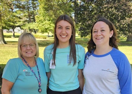 McKenzie Anderson (center) with National Church Residences social workers Julie Spencer (left) and Sarah Neal (right)