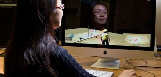 AN OHIO computer sciences student is shown working on a computer 