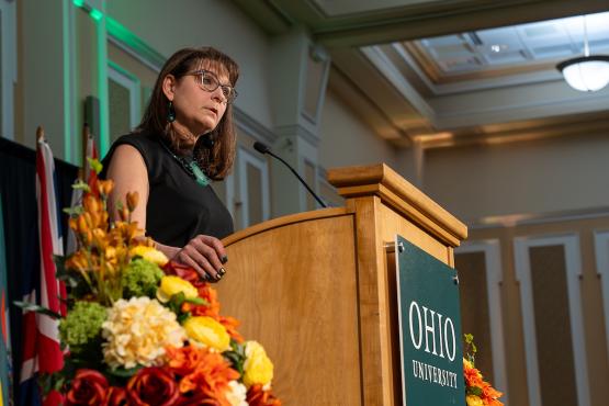 Gillian Ice speaks to the crowd at the Global Engagement Awards ceremony in the Baker Ballroom