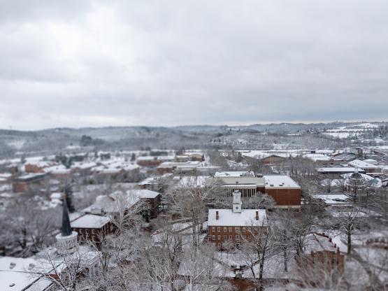 Cutler Hall, the College Green and the surrounding community is shown covered in snow in this aerial image
