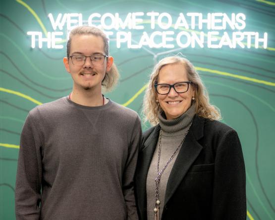 Adam McKnight and Lyn Redington pose for a photo in the Bobcat HangOUt