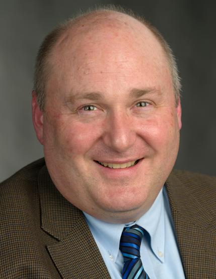 A headshot of Ohio University Professor Geoff Dabelko.