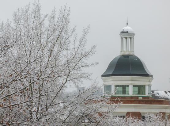  An OHIO building is shown next to a tree covered in ice and snow on a winter&amp;amp;#039;s day at  