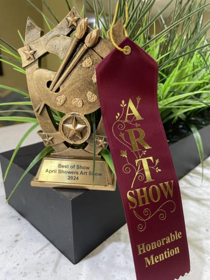 Metal trophy with paint brushes and palette 