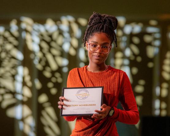 Victory Achebumere is shown with her award at the Leadership Awards