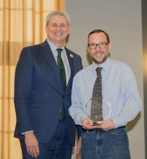 Provost Don Leo and Paul Shovlin are shown with Shovlin's award