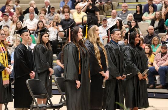 OHIO graduates stand during the OHIO Eastern Graduation Recognition Ceremony