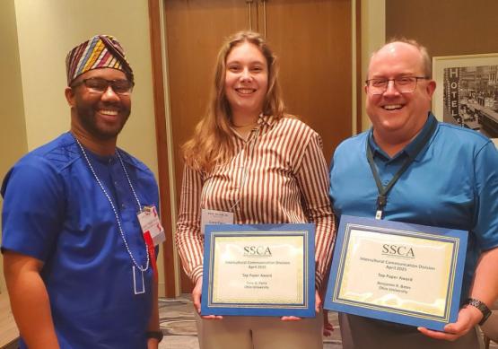  Cora Farra holds the Intercultural Communication Division Top Paper Award. 