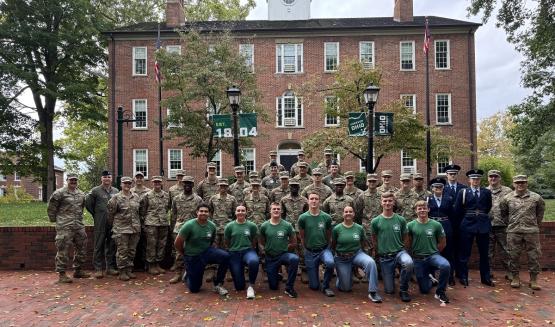  The members of Air Force ROTC Detachment 650 stand in front of Cutler Hall on the College Green 