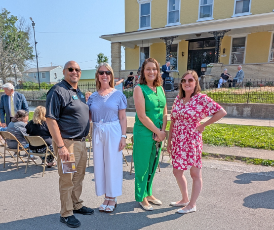 Student Services Director Robert Pleasant, Dean Dr. Deborah Marinski, Community Programming Coordinator Teresa Smith, and Communication & External Relations Manager Sarah Simmons in front of the Campbell House