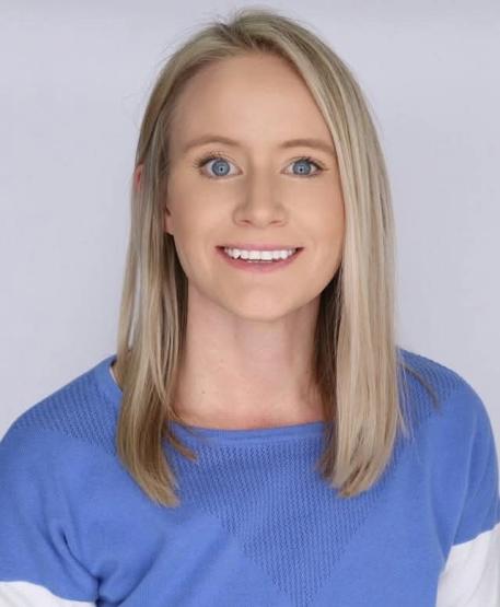  Headshot of Laura Holbrook, blonde hair wearing blue shirt 