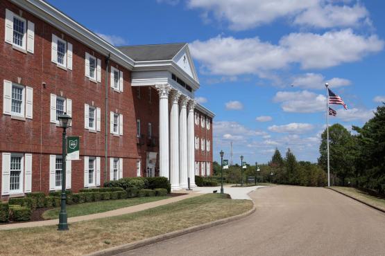  Ohio Univeristy Eastern, Shannon Hall: Large three story brick building with 4 white collumns at the entrance. 