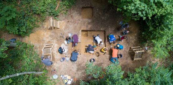  A group of students doing an archaeology dig. 