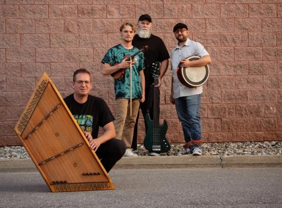  Ted Yoder Band pose with their instruments 