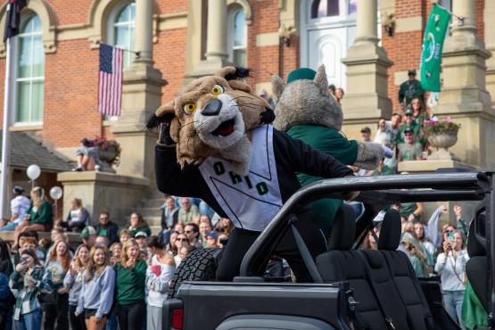 Rufus the Bobcat rides in the Homecoming Parade