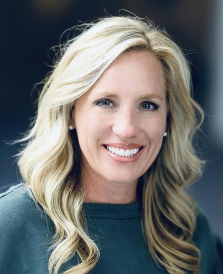 headshot of smiling woman with blonde hair