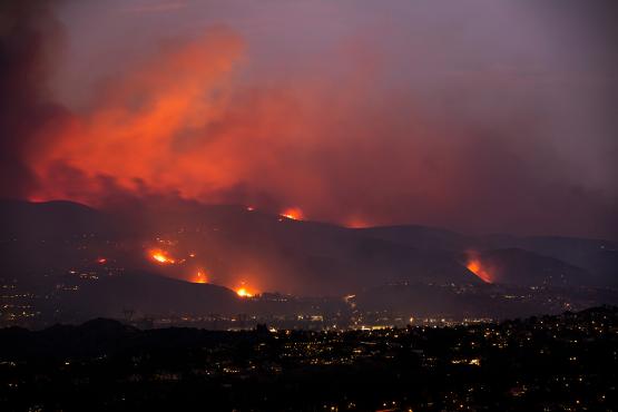 Fires burn on the dry hills surround the Los Angeles area.