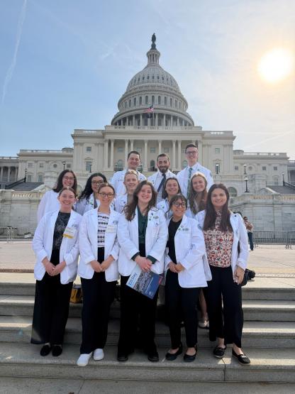 HCOM students pose in front of the Capitol in Washington D.C.