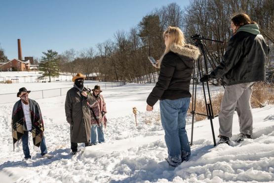Students making a film in the snow
