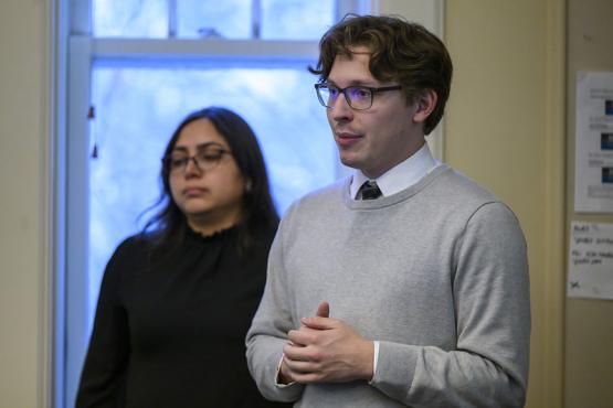 Spencer Johnson gives a presentation while another OHIO student looks on from behind him