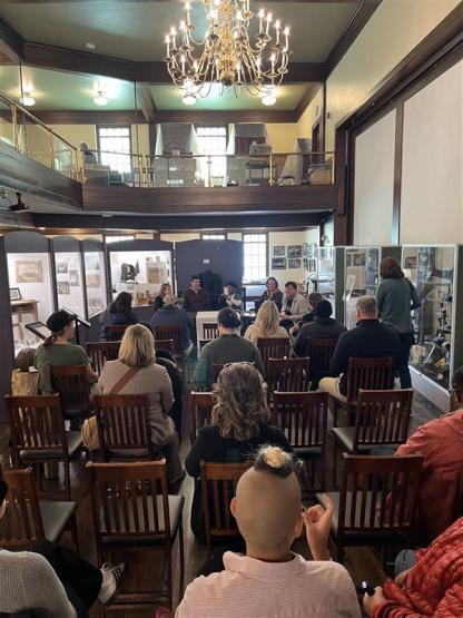 OHIO faculty lead a community presentation in a museum in the community