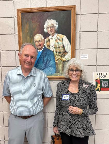 Local artists posing with artwork