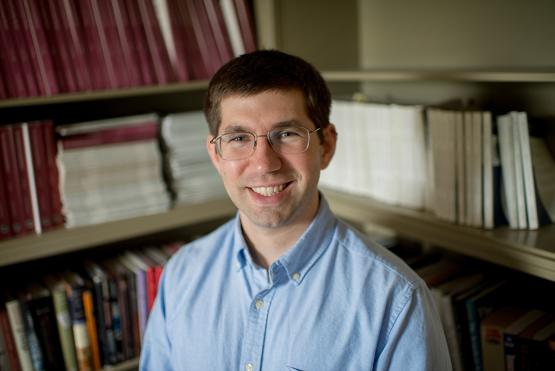 A headshot of Ohio University Associate Professor of Economics Daniel Karney
