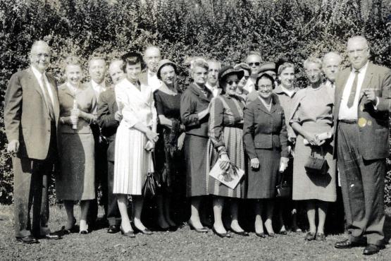 This image from 1959 shows the members of the Lancaster Branch Advisory Committee standing together outside