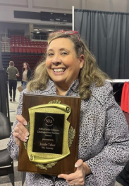 Jennifer Talbert is shown with the Distinguished Service Award