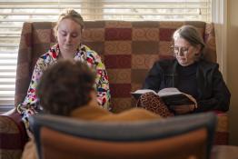 A student and the dean of the Honors Tutorial College reading during the Drop Everything and Read event