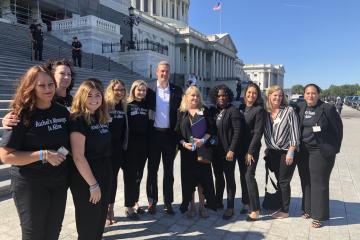 The Rachel's Angels group poses for a photo with Rep. Tim Ryan (D-OH). Ohio University student Katie Bender is third from the right.