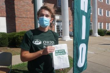 Student Nick Nolan picked up his Be Safe Bobcats bag during the Bobcat Blitz event at Ohio University Eastern during fall semester 2020. 