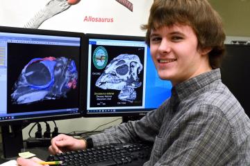 OHIO student Daniel Dunfee studying skull growth in the Jurassic ornithopod dinosaur using microCT scanning.