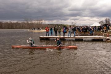 The Ohio University concrete canoe team tests its canoe in Lake Snowden. 