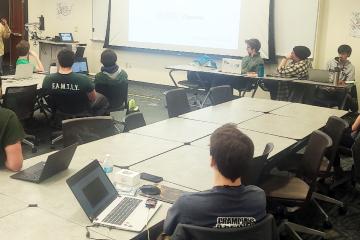 Computer science students are shown during one of their classes