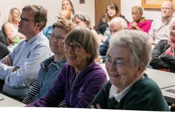 A photo of people at an Age-Friendly Athens County community meeting