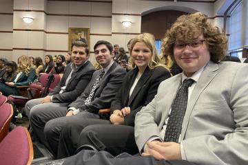 Lincoln Schaaf, Zach Donaldson, Ava Poling, and Ayden Mcdougle, Mock Trial members at the AMTA regional tournament.