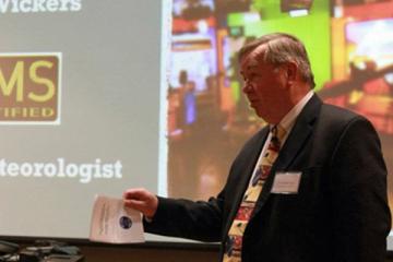 Dr. Ron Isaac introducing an OHIO alumni speaker at the Ohio University Meteorology Symposium in April 2012.
