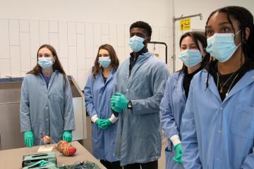 Participants of Medical Student for a Day in the anatomy lab.