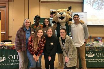 Center for International Studies students and staff pose with Rufus.