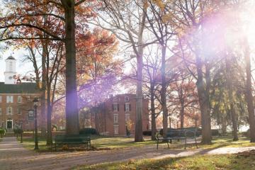 The sun shines on Cutler Hall on College Green in Athens, Ohio