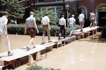 Before the epic task of moving the Hocking River took place in 1970, water would course through campus and cause massive flooding.