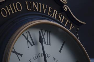 Large clock face bearing the words Ohio University
