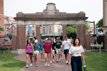  Prospective students and their loved ones enter OHIO’s historic College Green during a campus tour this summer
