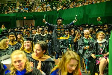 Graduate celebrates at Spring 2024 Ohio University Commencement