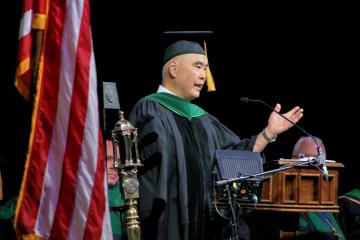 Alumnus Andrew Yuan, D.O., spoke at HCOM's graduation