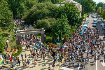 OHIO students walk up Court Street and into the College Green for the Student Activity Fair