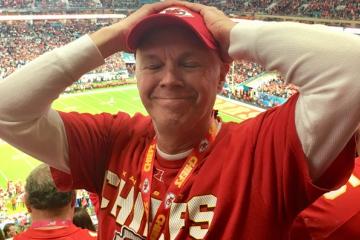 Roger Cooper is shown at a Kansas City Chiefs game